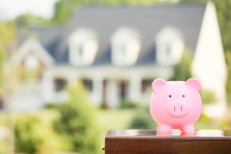 Für einen Hauskauf benötigt man meist einen Immobilienkredit